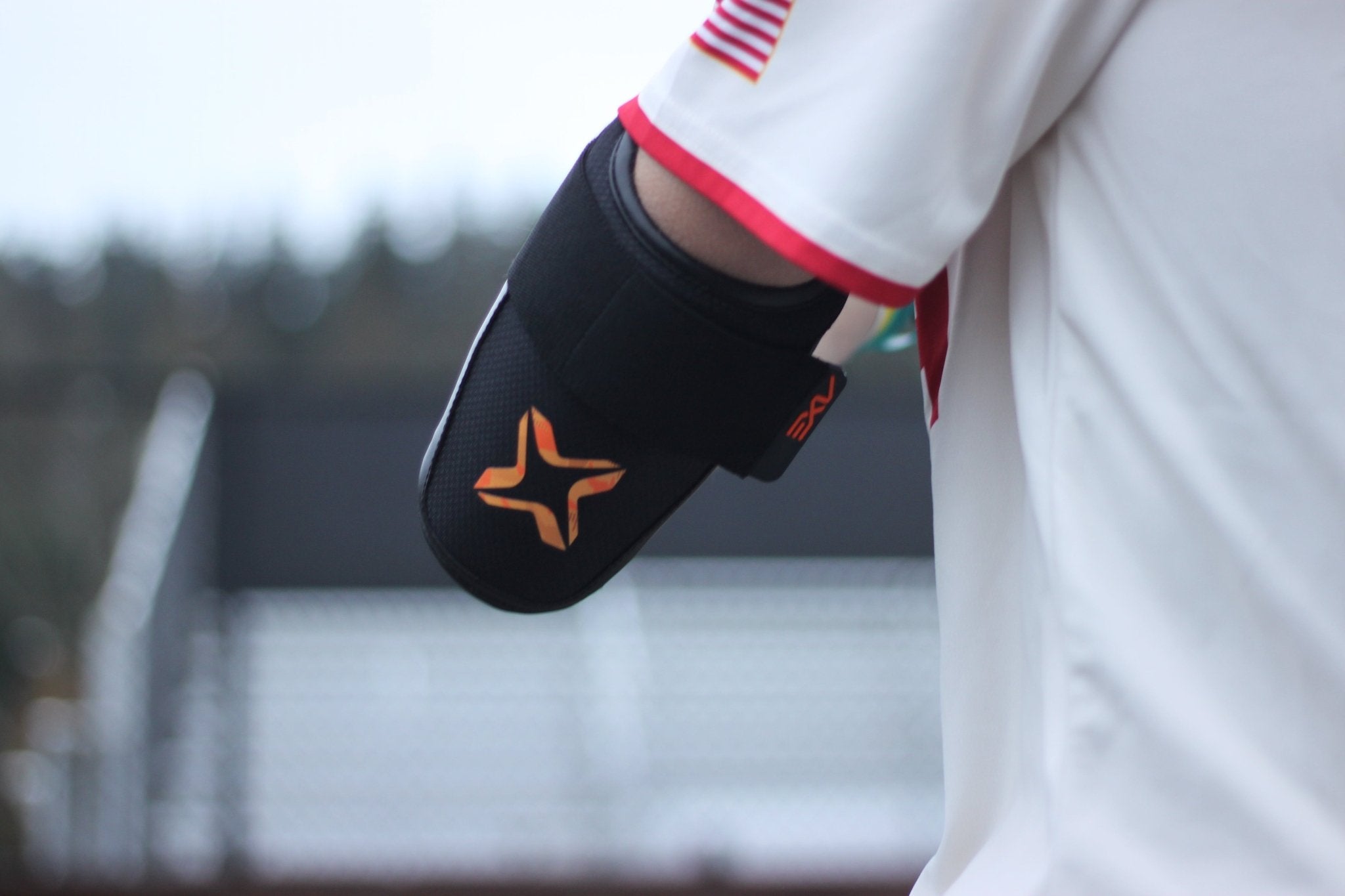 Axe Armor Elbow Guards - Magma Orange - Maximum Velocity Sports