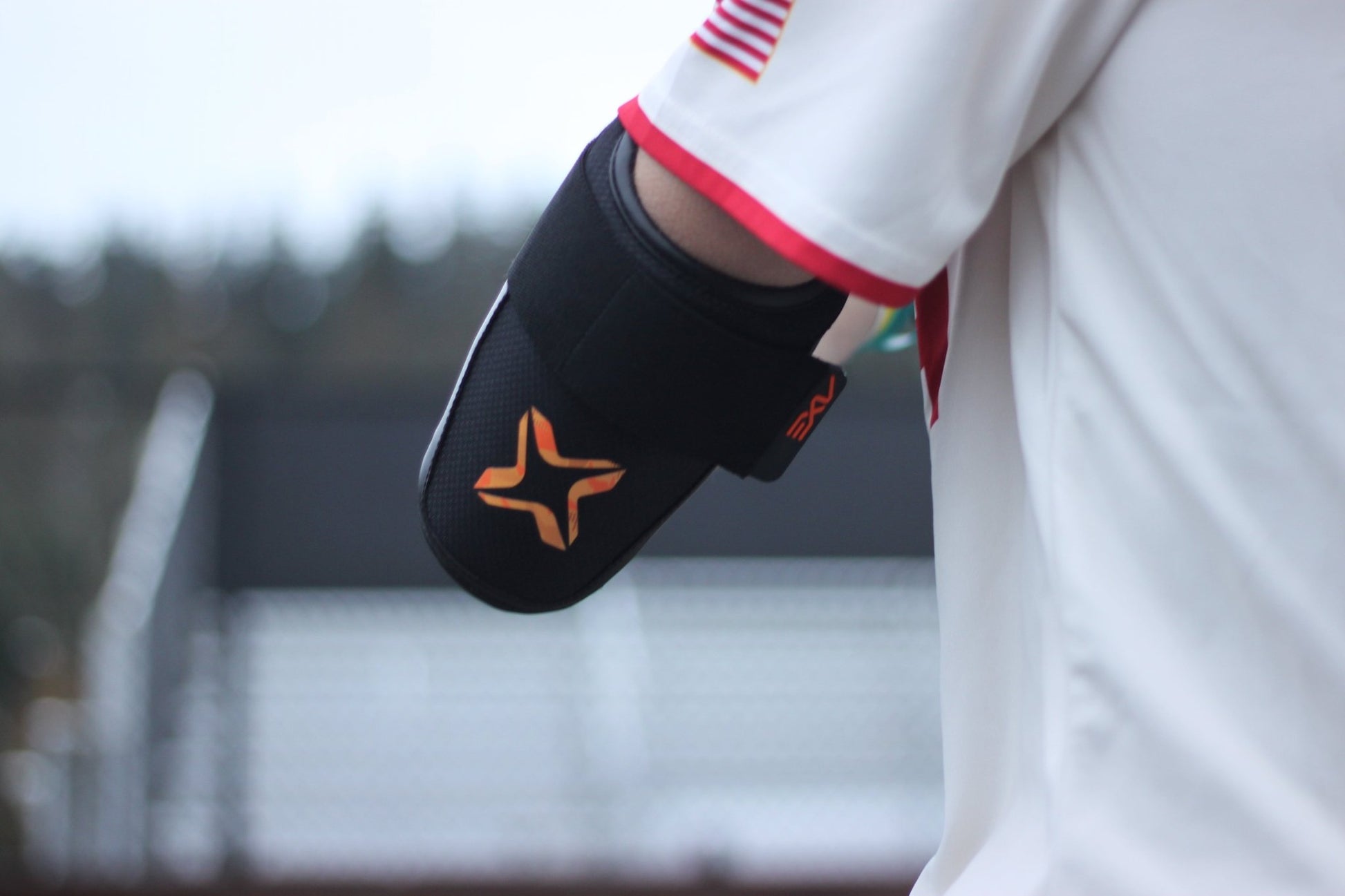 Axe Armor Elbow Guards - Magma Orange - Maximum Velocity Sports