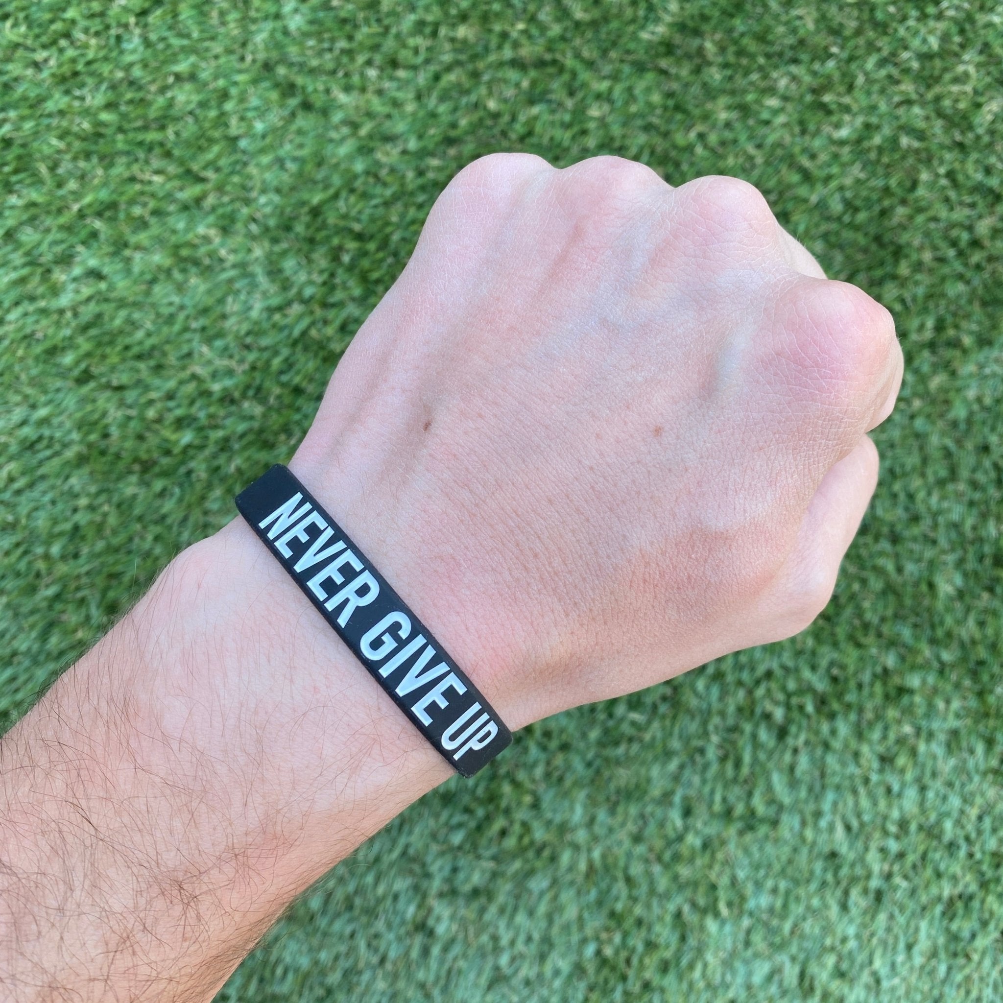 NEVER GIVE UP Wristband - Maximum Velocity Sports