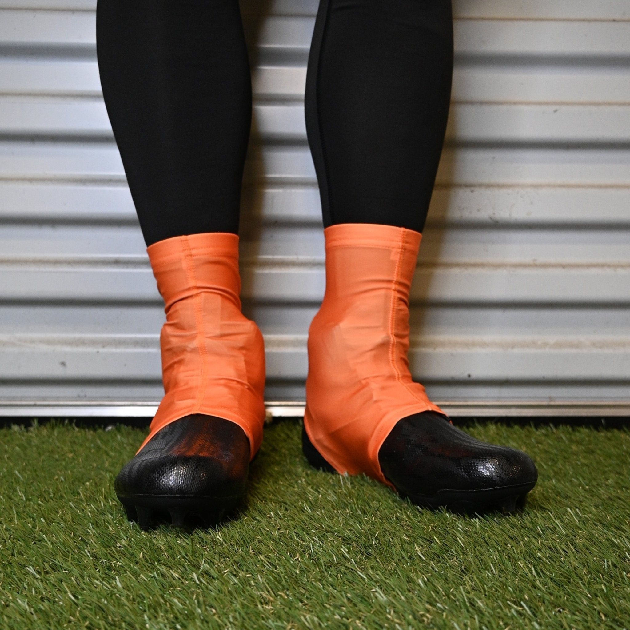Orange Cleat Covers (Spats) - Maximum Velocity Sports