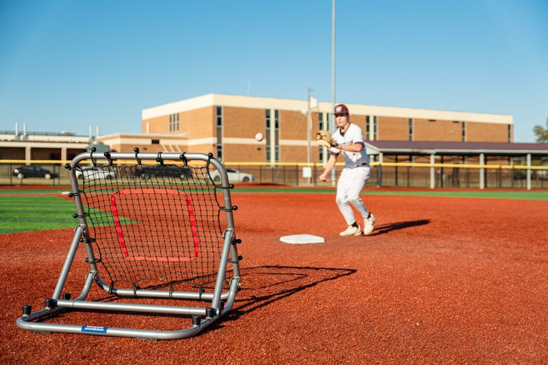 Player using 3x3 rebounder for baseball fielding and reaction drills