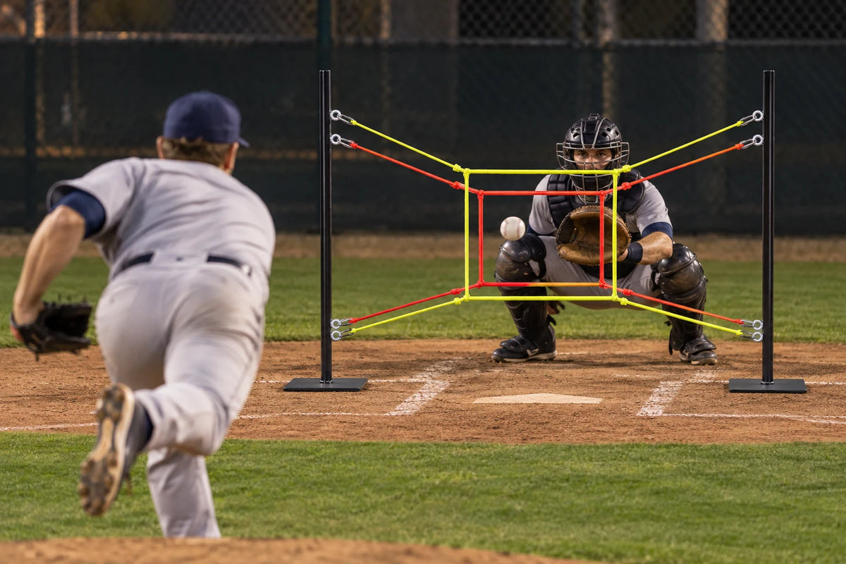 Illustrative bullpen scene showing a pitcher throwing through two cord target zones toward a catcher.