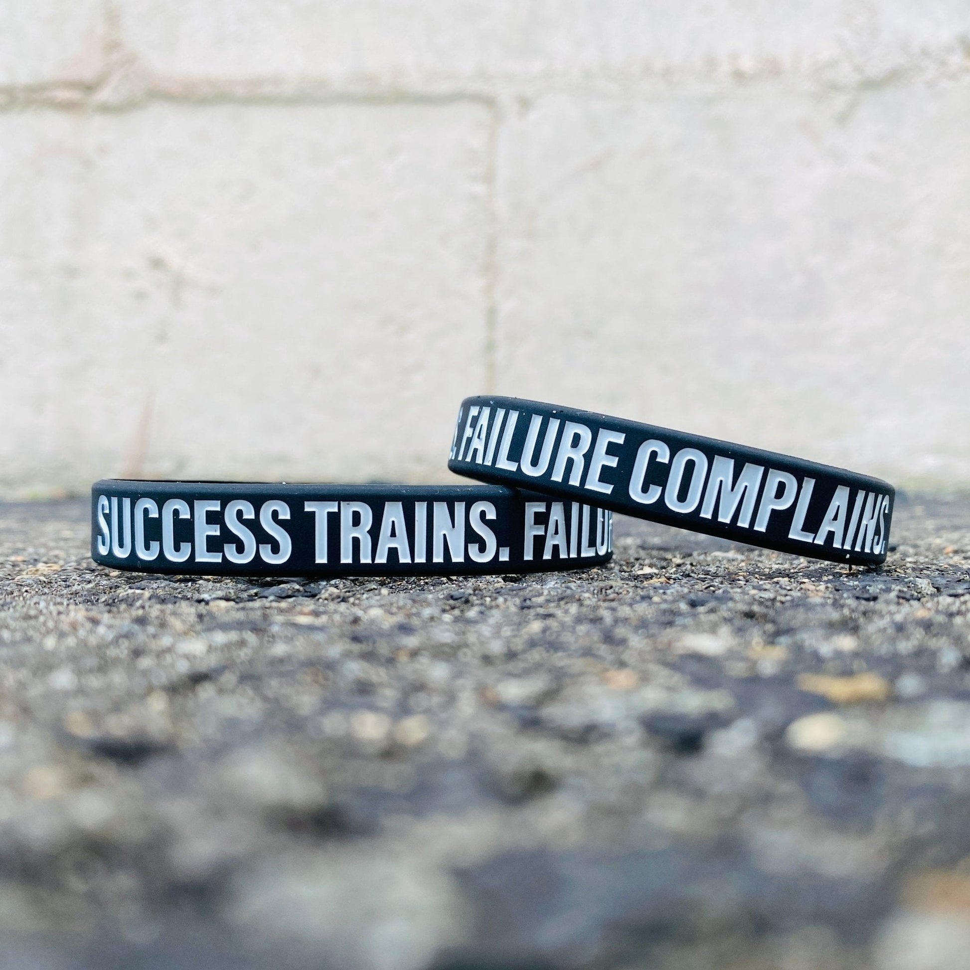 SUCCESS TRAINS. FAILURE COMPLAINS. Wristband - Maximum Velocity Sports