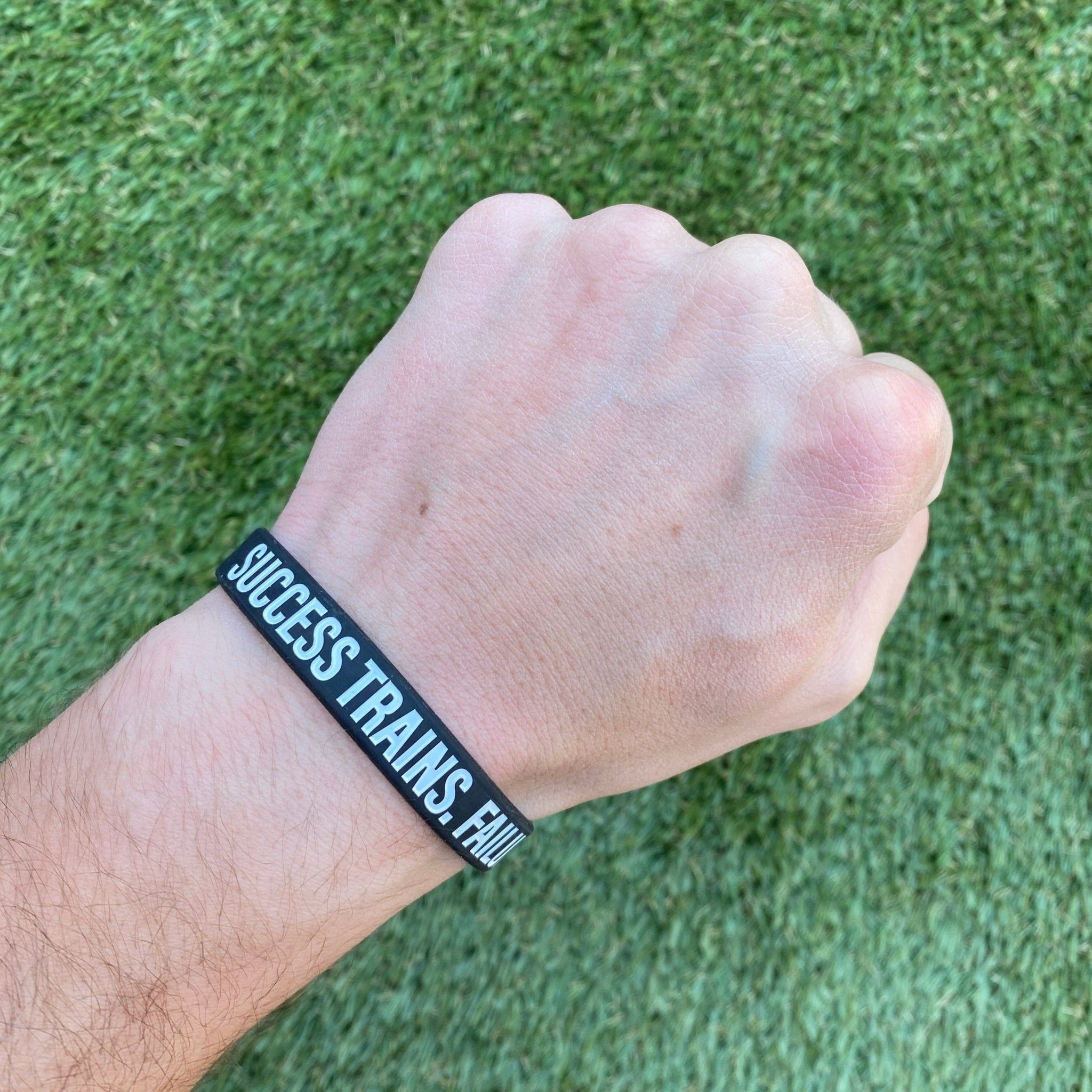 SUCCESS TRAINS. FAILURE COMPLAINS. Wristband - Maximum Velocity Sports